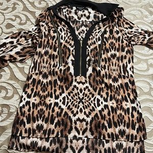 NWOT size XS Cheetah print Bebe shirt!